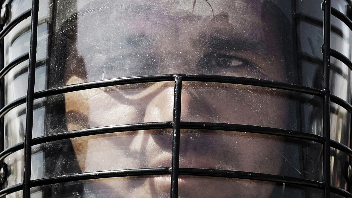 An Afghan soldier stands attention during a hand over ceremony of U.S.- run prison to Afghan government in Bagram north of Kabul, Afghanistan, Monday, Sept. 10, 2012. (AP Photo/Musadeq Sadeq)