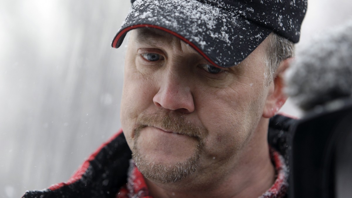 In this Jan. 8, 2010 file photo, Bradley Birkenfeld, a whistleblower in the tax evasion case against Swiss bank UBS AG, pauses during a press conference outside the Schuylkill County Federal Correctional Institution in Minersville Pa, before reporting to the federal prison. (AP Photo/Carolyn Kaster, File )