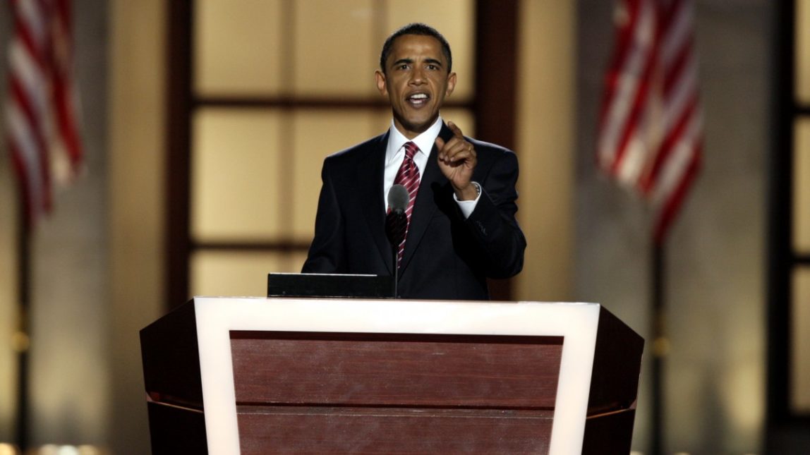In this Aug. 28, 2008, file photo, Democratic presidential candidate, Sen. Barack Obama, D-Ill., gives his acceptance speech at the Democratic National Convention at Invesco Field at Mile High in Denver. (AP Photo/Ron Edmonds, File)