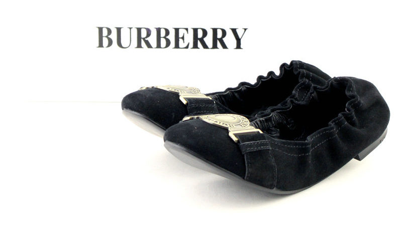 An advertisement for Burberry is displayed in December 2010. (Photo by foeoc kannilc via Flikr)