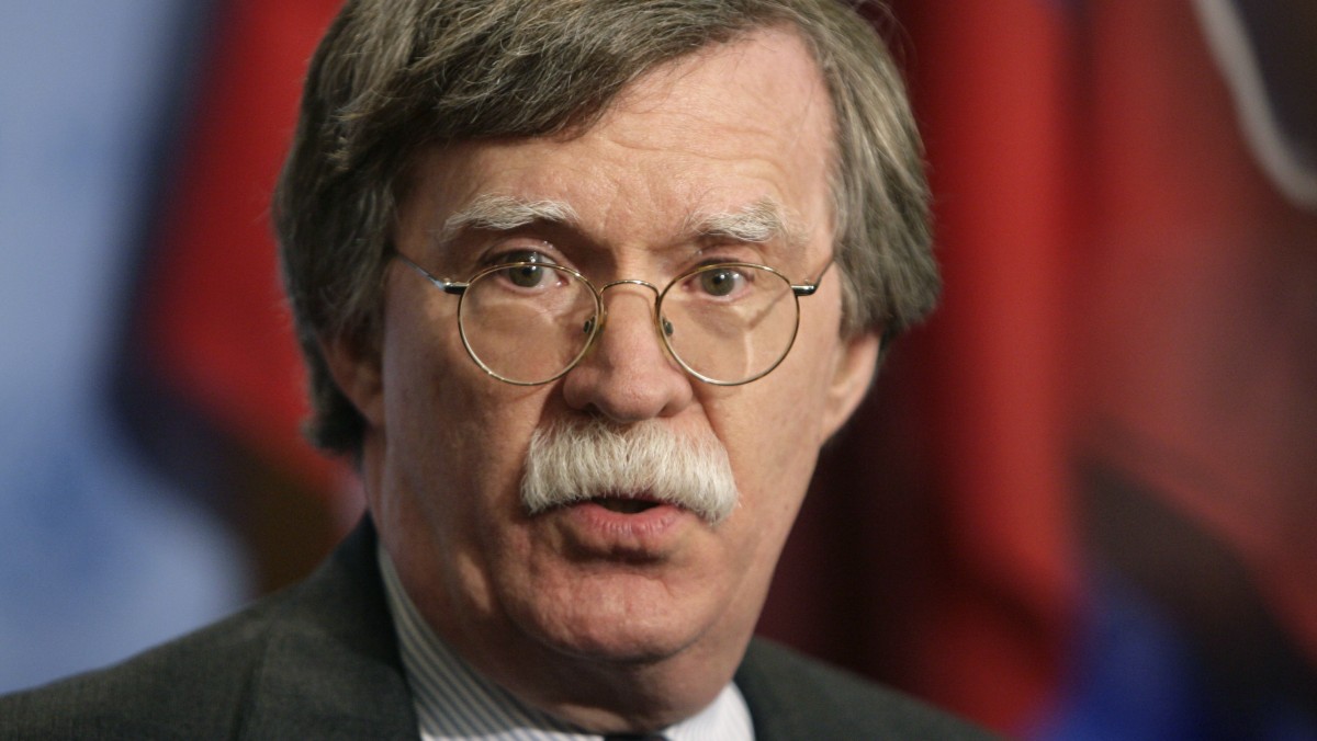 United States Ambassador to the United Nations John Bolton speaks to the media before a Security Council meeting at United Nations Headquarters in New York, Wednesday, Dec. 6, 2006. (AP Photo/Seth Wenig)