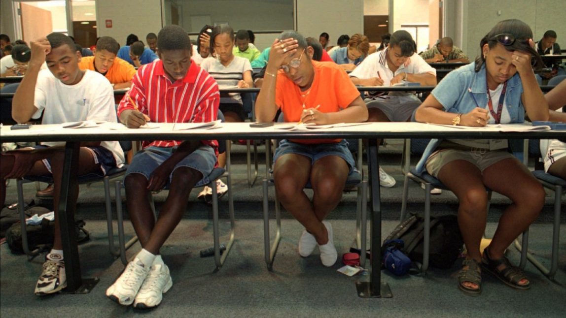 High school juniors try to stay focused as they take the SAT test. (AP Photo/Mary Ann Chastain)