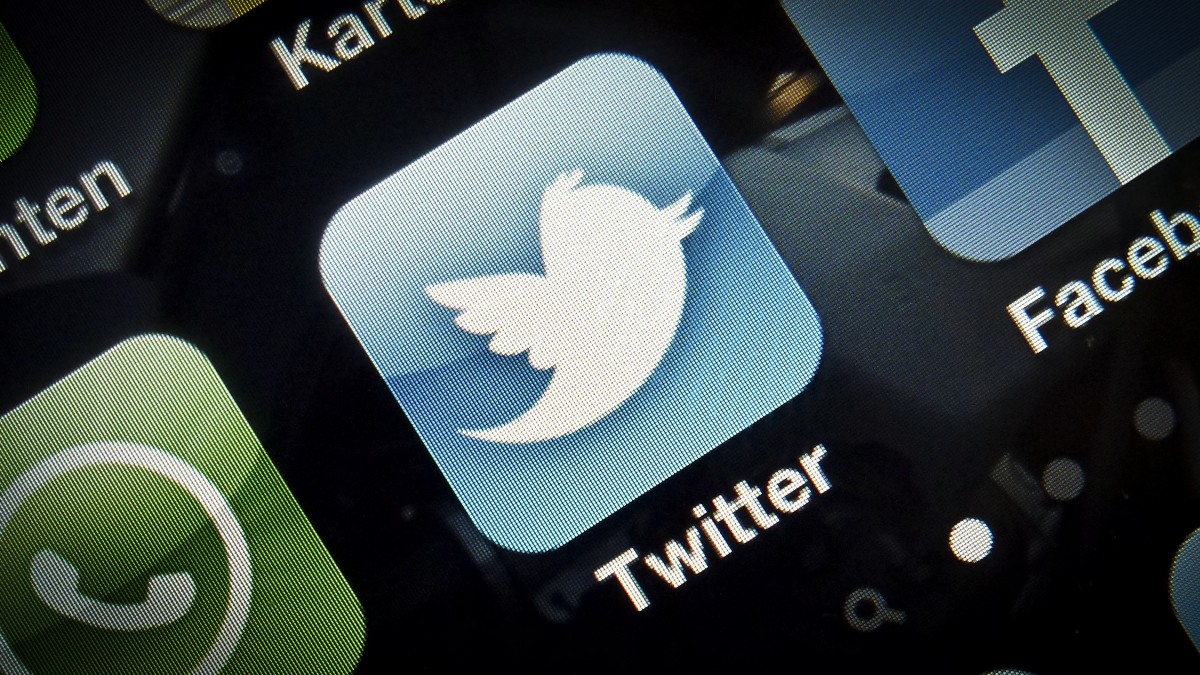 A photo illustration shows the icon of the Twitter app on a smartphone. (Photo Timur Emek/file)