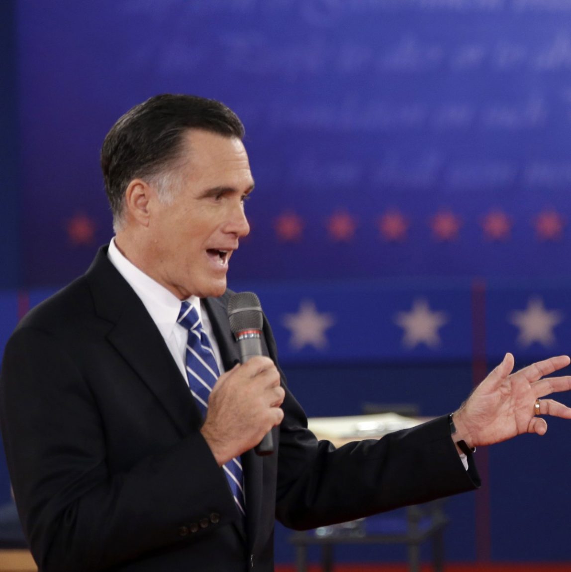 In this Oct. 16, 2012 file photo, President Barack Obama and Republican presidential candidate, former Massachusetts Gov. Mitt Romney exchange views during the second presidential debate at Hofstra University in Hempstead, N.Y. (AP Photo/David Goldman, File)