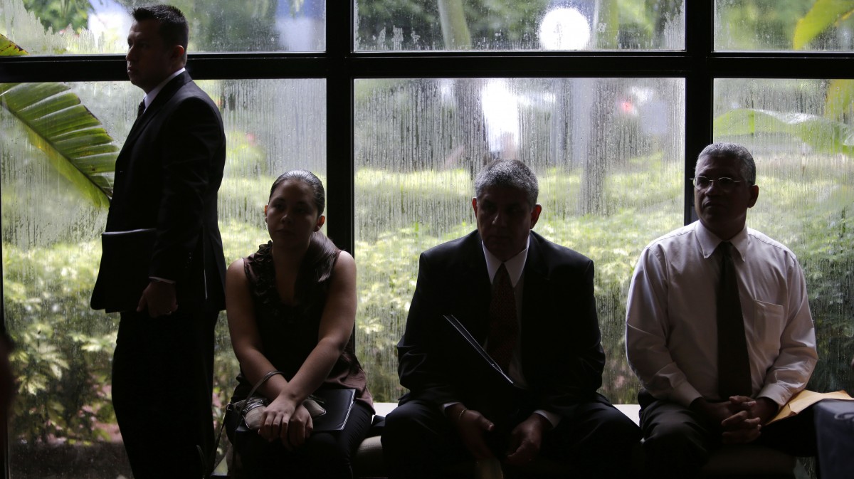 In this Monday, Sept. 17, 2012, file photo, job applicants wait for the opening of a job fair held by National Career Fairs in Fort Lauderdale, Fla. (AP Photo/Lynne Sladky, File)