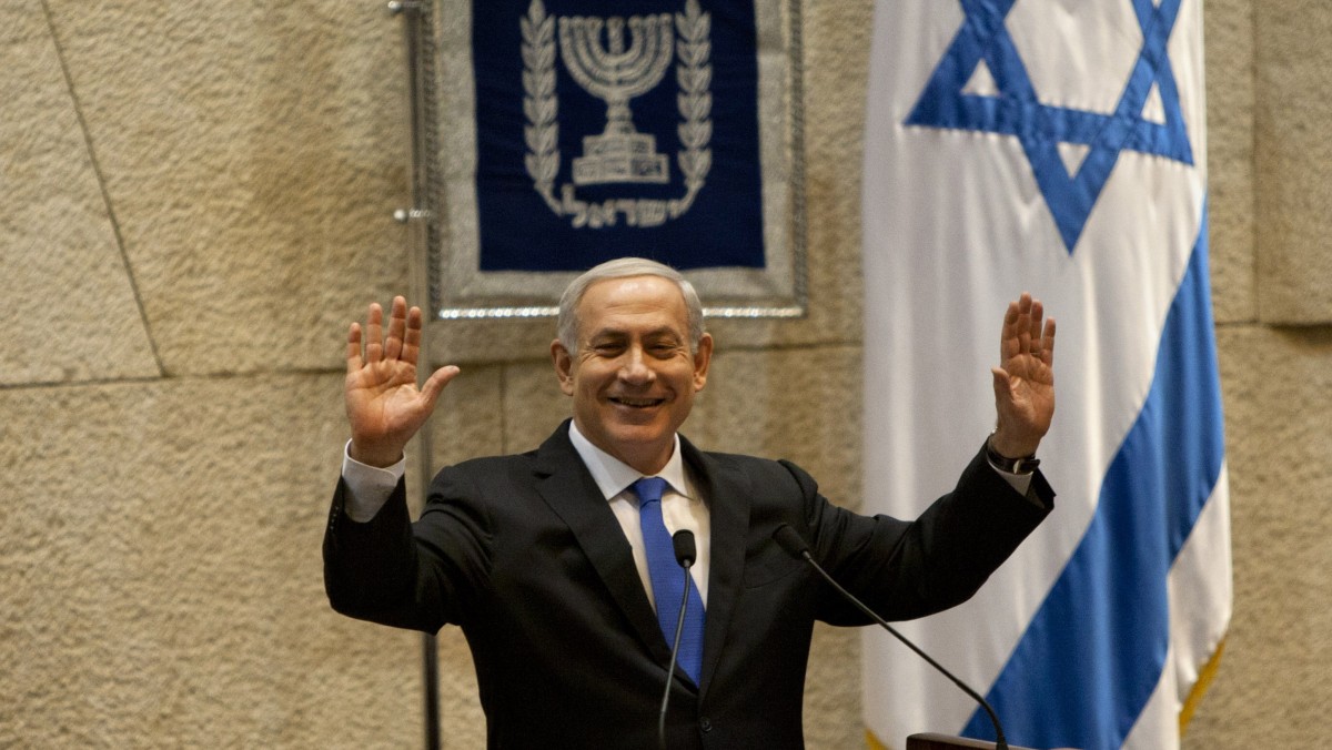 Israeli Prime Minister Benjamin Netanyahu gestures as he delivers a speech at the Knesset, Israel's parliament in Jerusalem, Monday, Oct. 15, 2012. (AP Photo/Sebastian Scheiner)