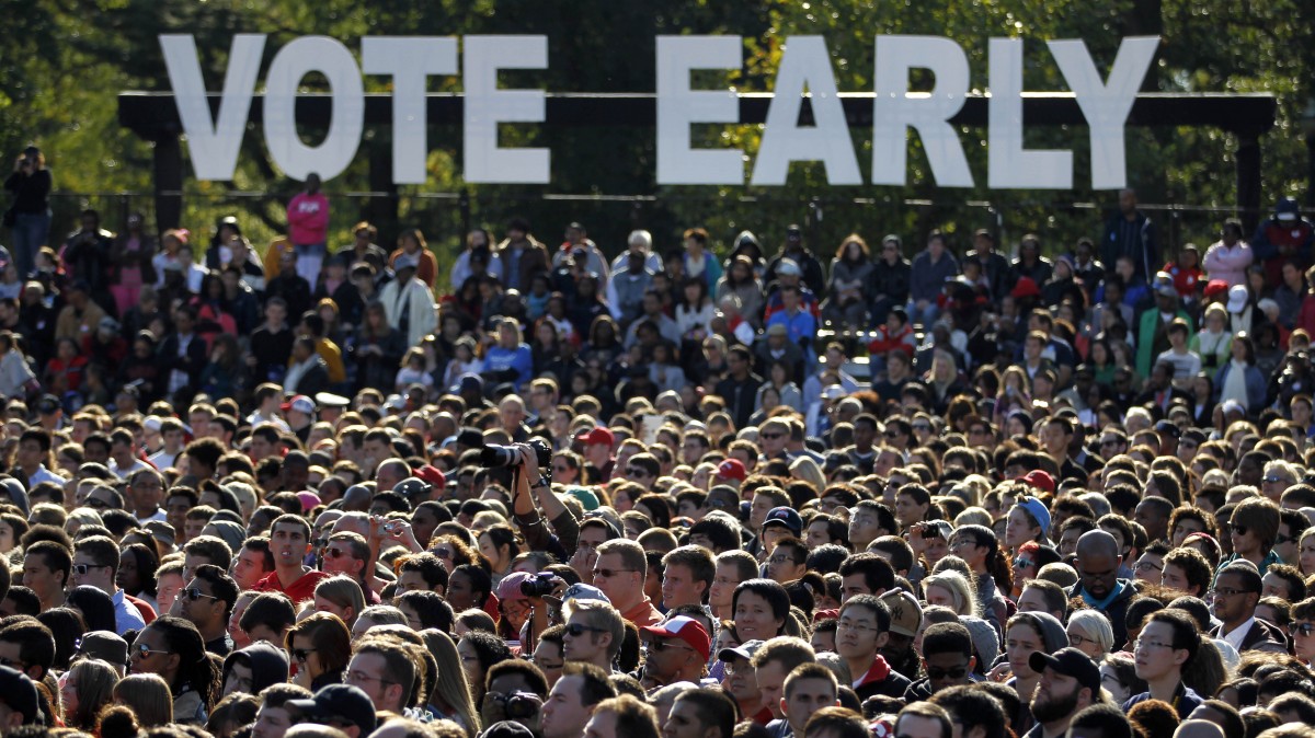 Supporters wait for President Barack Obama to speak during a campaign event at The Ohio State University Oval Tuesday, Oct. 9, 2012, in Columbus, Ohio. (AP Photo/Tony Dejak)