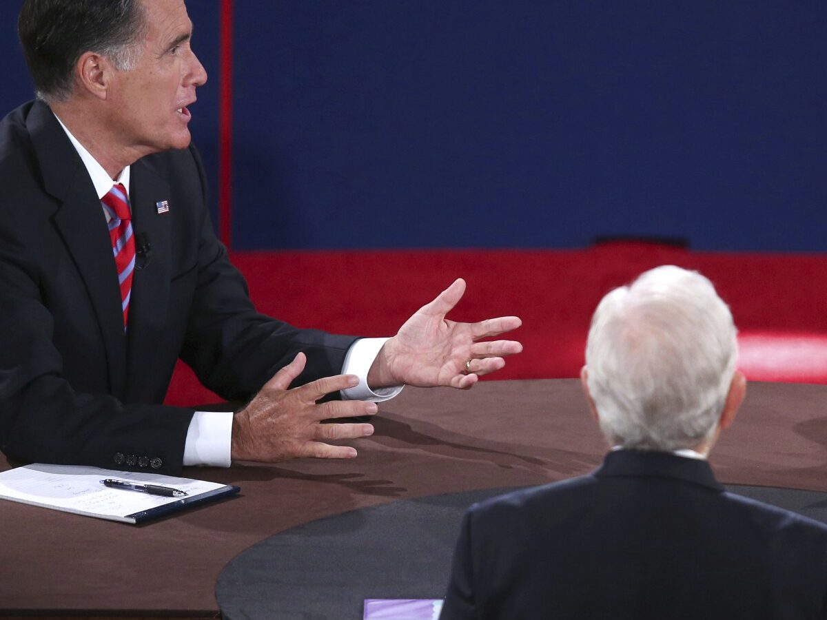 Republican presidential nominee Mitt Romney and President Barack Obama answer a question during the third presidential debate at Lynn University, Monday, Oct. 22, 2012, in Boca Raton, Fla. (AP Photo/Pool-Win McNamee)