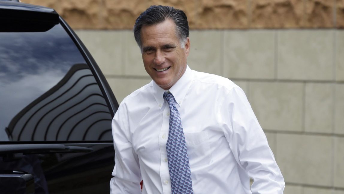 In this Sept. 9, 2012 file photo, Republican presidential candidate Mitt Romney arrives at his campaign headquarters in Boston, to prepare for the presidential debates. (AP Photo/Charles Dharapak)