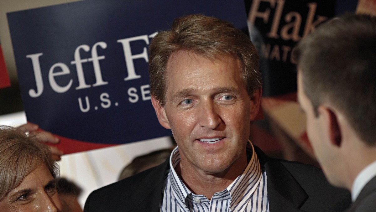 In this Aug. 28, 2012, file photo Arizona Republican Senate candidate and current U.S. Rep. Jeff Flake, R-Ariz., speaks at a primary election night party at his home in Mesa, Ariz. (AP Photo/Matt York, File)