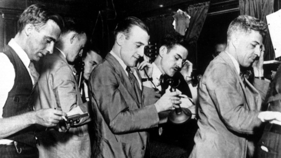 In this Oct. 25, 1929 file photo, stock brokers are seen at the stock exchange in New York, USA, as panic shares selling continues from the previous day. It was the day the stock exchange crashed and broke loose a world wide recession and financial crisis and thus was termed 'Black Friday'. (AP Photo/Str)