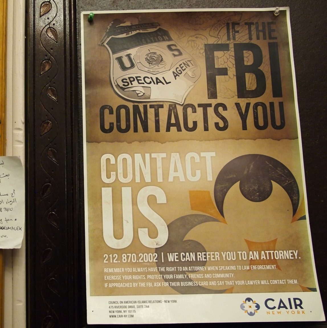 Flyers are posted on a wall outside of the prayer room at the Islamic Culture Center in Newark, N.J., Wednesday, Feb. 15, 2012. (AP Photo/Charles Dharapak)