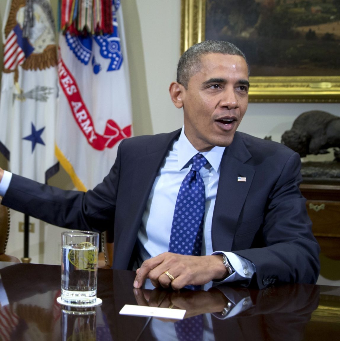 In this Nov. 16, 2012, file photo, President Barack Obama acknowledges House Speaker John Boehner of Ohio while speaking to reporters in the Roosevelt Room of the White House in Washington, as he hosted a meeting of the bipartisan, bicameral leadership of Congress to discuss the deficit and economy. (AP Photo/Carolyn Kaster, File)