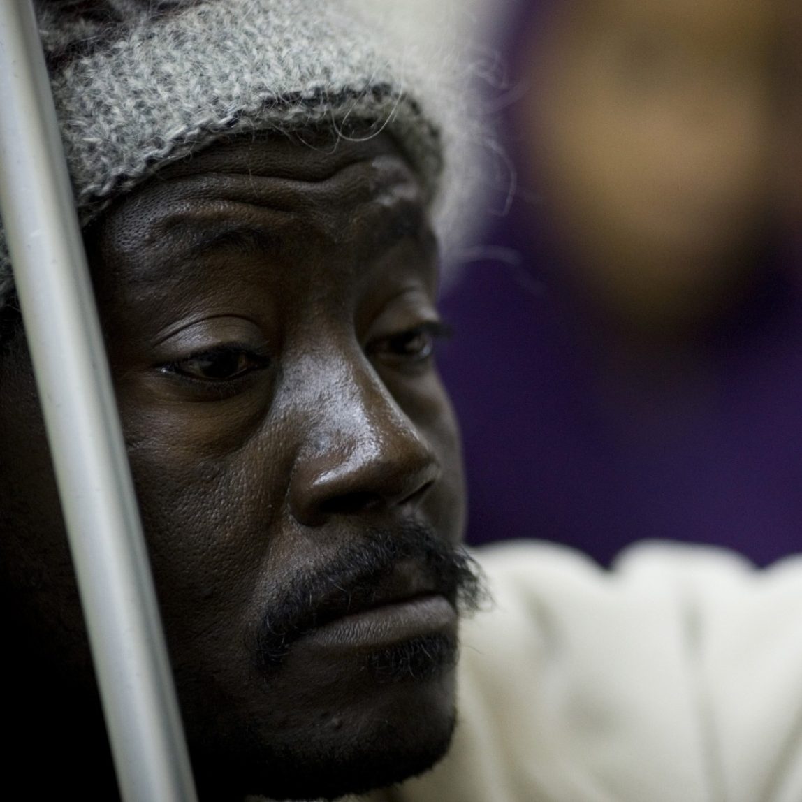 An African migrant worker waits for free medical treatment at the Physicians for Human Rights clinic in Jaffa, a mixed Arab Jewish neighborhood of Tel Aviv, Israel, Wednesday, Feb. 23, 2011. (AP Photo/Ariel Schalit)