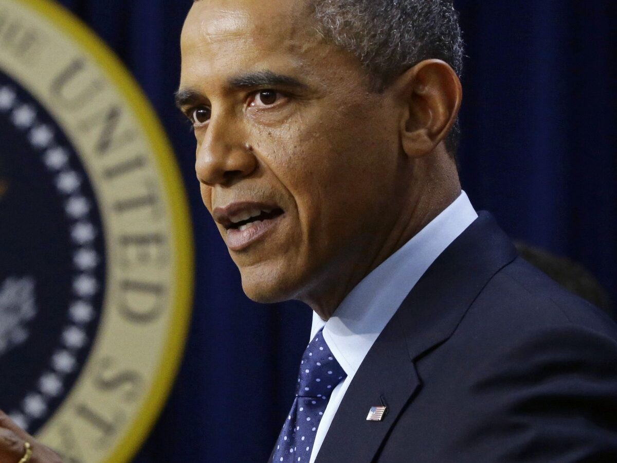 President Barack Obama gestures as he speaks about the fiscal cliff, Monday, Dec. 31, 2012, in the South Court Auditorium at the White House in Washington. (AP Photo/Charles Dharapak)