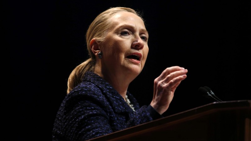 Secretary of State Hillary Rodham Clinton gestures as she gives a speech: "Frontlines and Frontiers: Making Human Rights a Human Reality," Thursday, Dec. 6, 2012, at Dublin City University in Dublin, Ireland. (AP Photo/Kevin Lamarque, Pool)