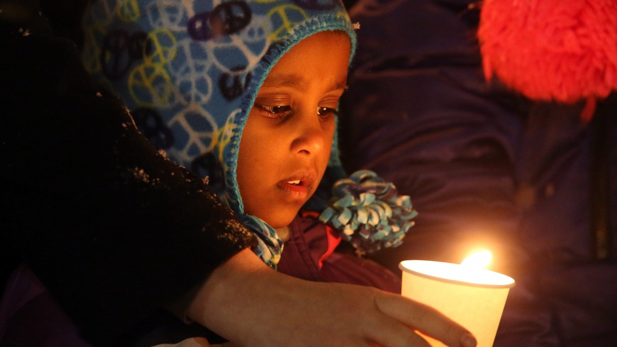 Friends, colleagues and supporters attend a vigil in Winnipeg, Canada, in memory of six year-old, Ana Marquez-Greene, a victim of last Fridays mass shooting in Newtown, Conn., on Monday Dec. 17, 2012. (AP Photo/The Canadian Press, Trevor Hagan)