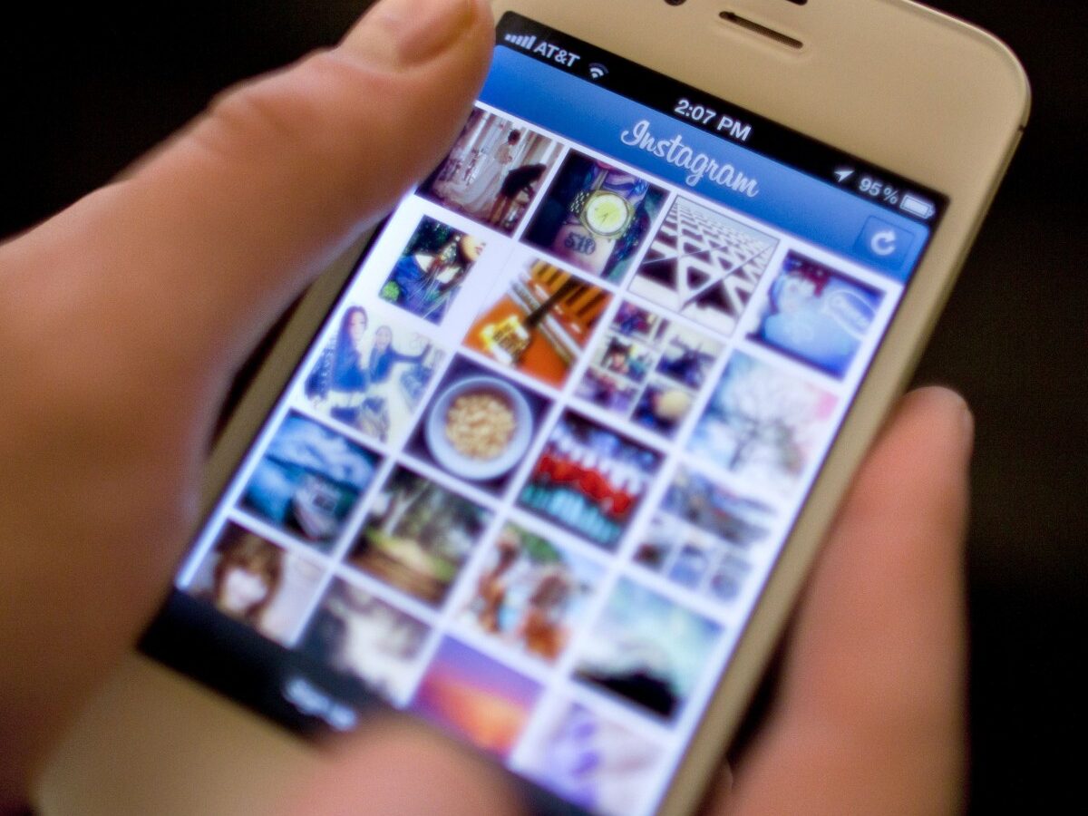 In this Monday, April 9, 2012, file photo, Instagram is demonstrated on an iPhone, in New York. (AP Photo/Karly Domb Sadof, File)