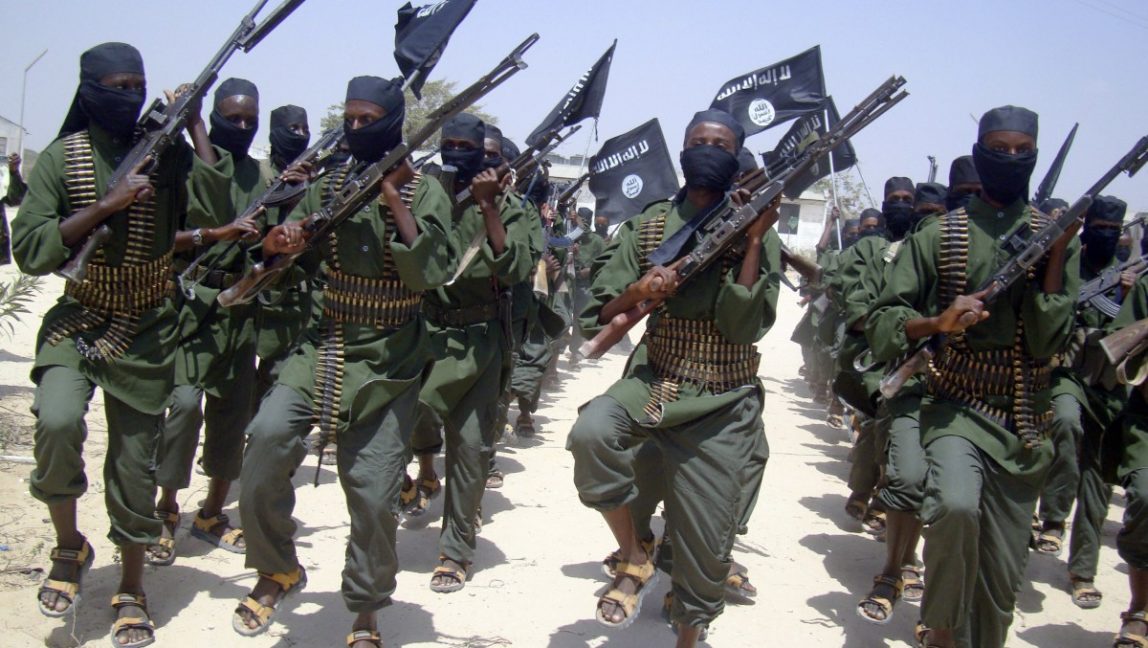 In this Thursday, Feb.17, 2011 file photo, al-Shabab fighters march with their weapons during military exercises on the outskirts of Mogadishu, Somalia.(AP Photo/Mohamed Sheikh Nor, File)