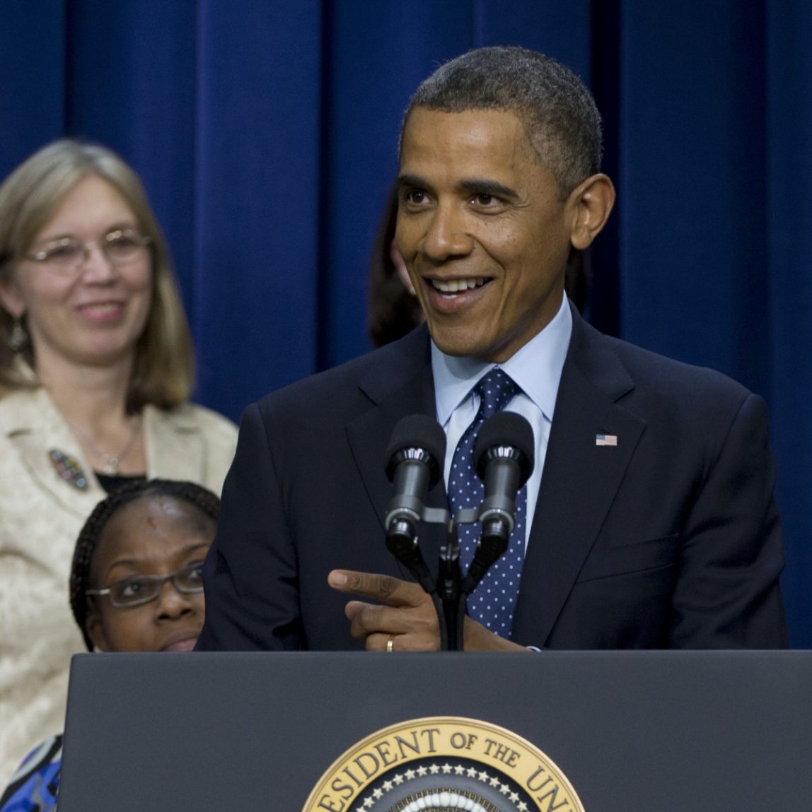 President Barack Obama smiles and gestures as he speaks about the fiscal cliff, Monday, Dec. 31, 2012, in the South Court Auditorium at the White House in Washington. (AP Photo/Carolyn Kaster)