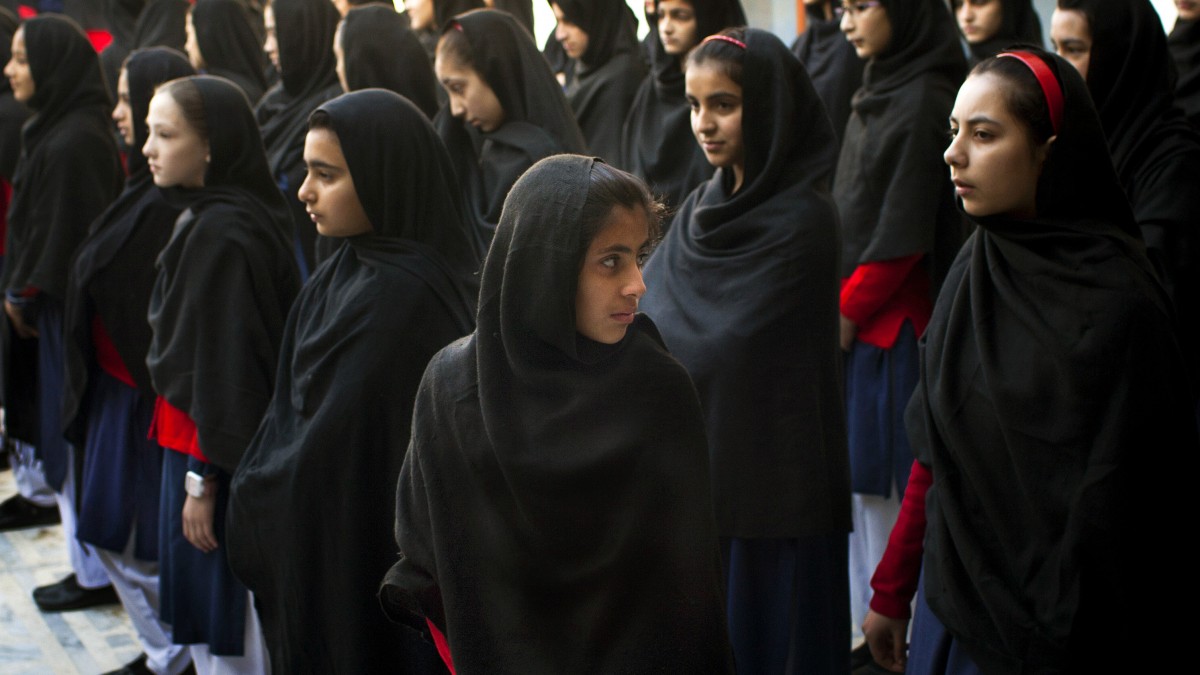 In this Nov. 15, 2012 photo, Pakistani school children gather at the patio of the Khushal School for Girls in Mingora, Swat Valley, Pakistan. (AP Photo/Anja Niedringhaus)