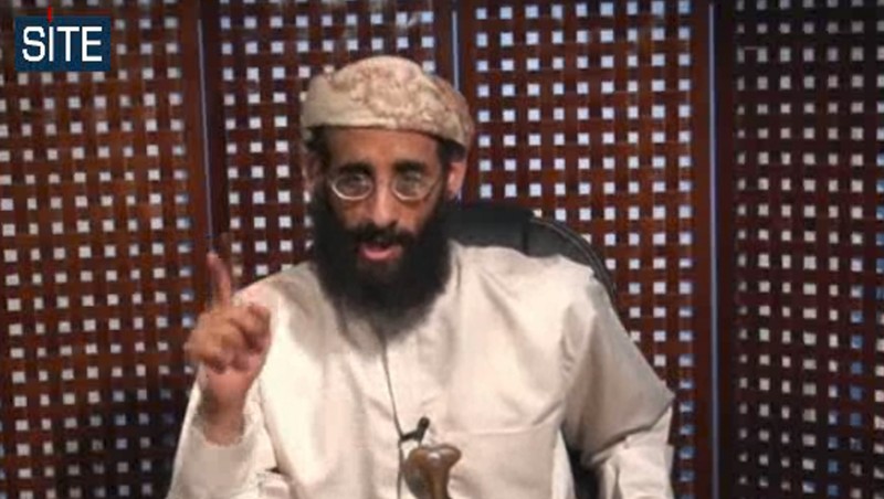 In this image taken from video and released by SITE Intelligence Group on Monday, Nov. 8, 2010, Anwar al-Awlaki speaks in a video message posted on radical websites. (Photo Anonymous/Site Intelligence Group/AP)