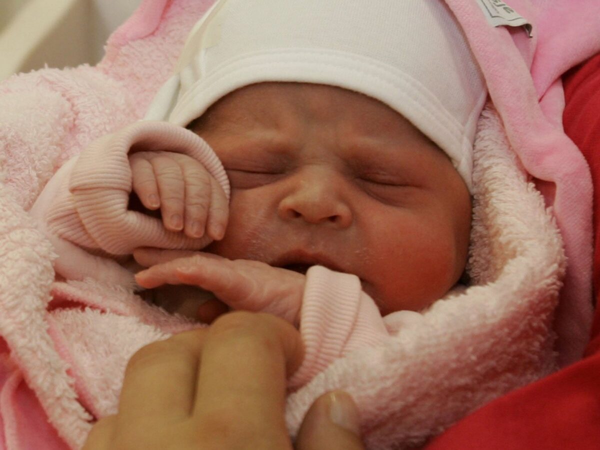 A newborn baby is seen on Tuesday, Oct. 18, 2005. (AP Photo/Pool/Maartje Blijdenstein)