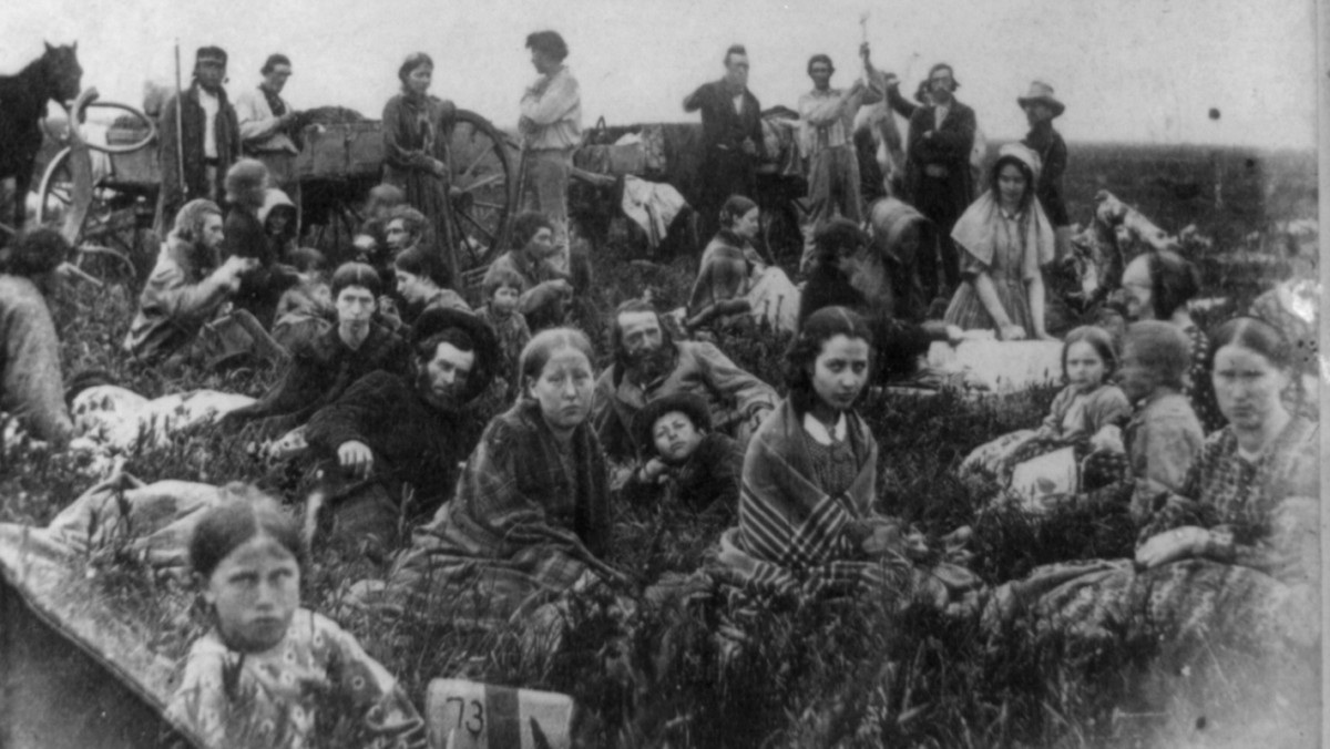 This photo is entitled "People escaping from the Indian massacre of 1862 in Minnesota, at dinner on a prairie." (Photo by Adrian J. Ebell)