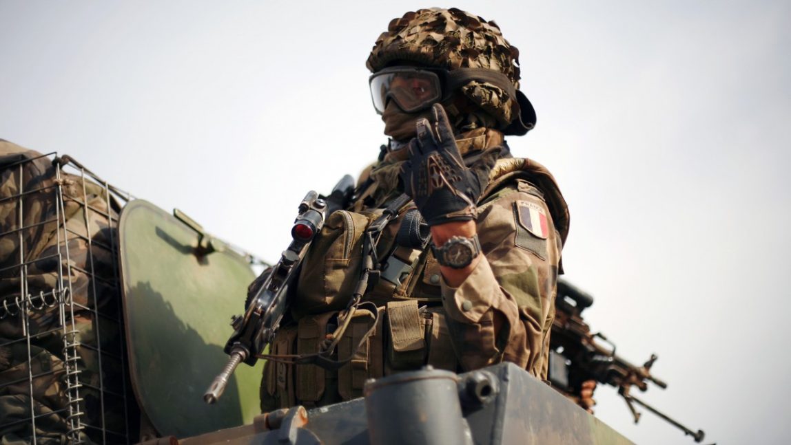 A convoy of French soldiers drives north as they pass through Segou, central Mali, some 240kms (140 miles) from Bamako Tuesday, Jan. 22, 2013. (AP Photo/Jerome Delay)