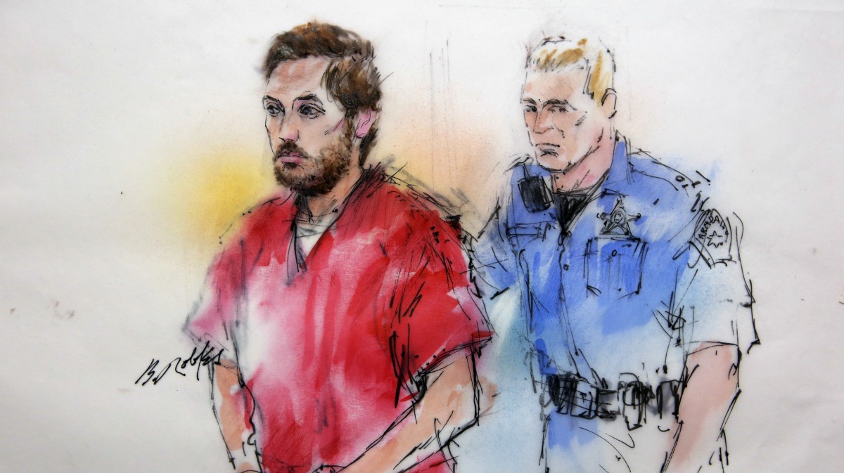 This courtroom sketch shows James Holmes being escorted by a deputy as he arrives at preliminary hearing in district court in Centennial, Colo., on Monday, Jan. 7, 2013. (AP Photo/Bill Robles, Pool)