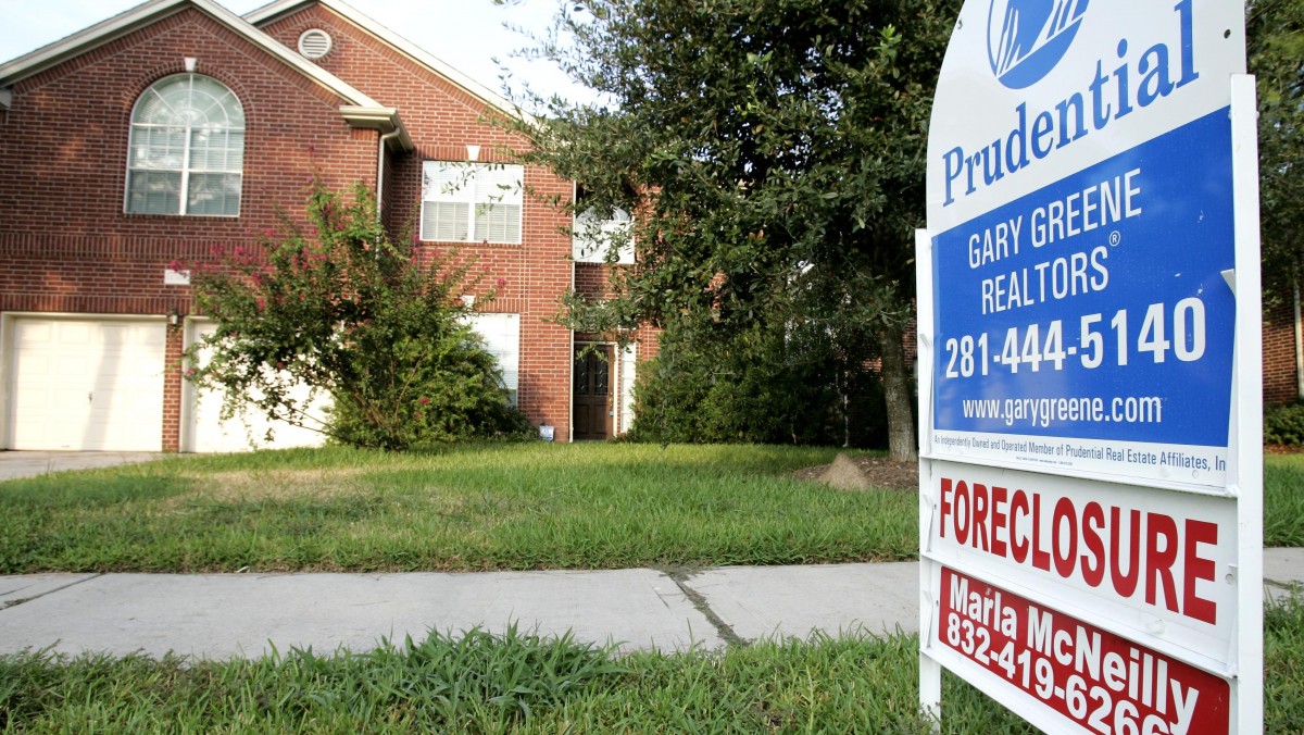 A foreclosure home for sale is shown in this Aug. 22, 2006 file photo taken in Spring, Texas. (AP Photo/David J. Phillip, File)