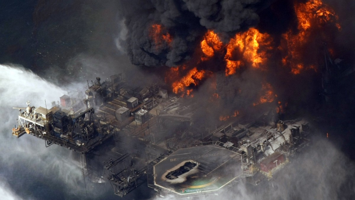 In this April 21, 2010 file aerial photo, the Deepwater Horizon oil rig burns in the Gulf of Mexico. (AP Photo/Gerald Herbert, File)
