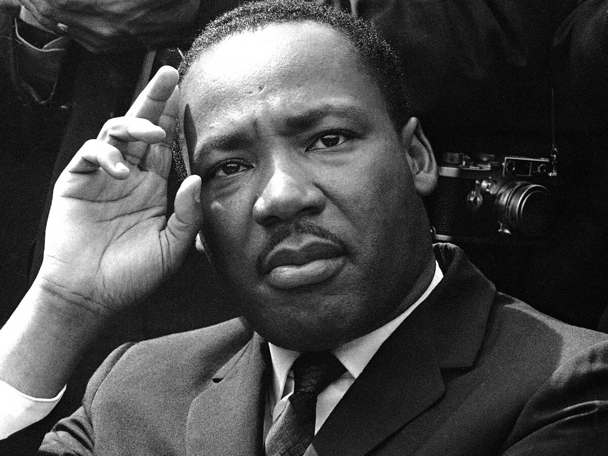 In this Sept. 16, 1963 file photo, Dr. Martin Luther King Jr. gives a news conference in Birmingham, Ala. announcing he and other African American leaders have called for federal Army occupation of Birmingham in the wake of the previous day's church bombing and shootings which left six blacks dead. (AP Photo)
