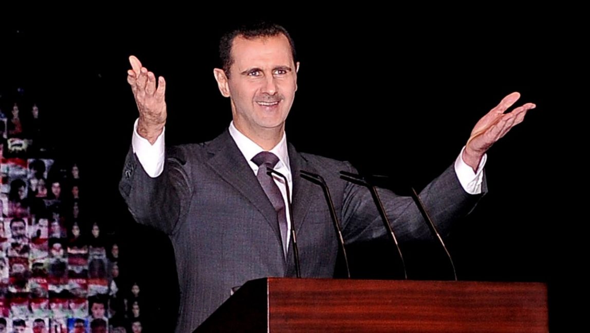 In this photo released by the Syrian official news agency SANA, Syrian President Bashar Assad gestures as speaks at the Opera House in central Damascus, Syria, Sunday, Jan. 6, 2013. (AP Photo/SANA)