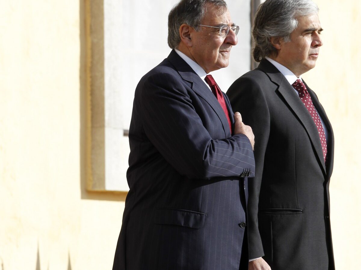 U.S. Defense Secretary Leon Panetta, second right, and Portugal's Defense Minister Jose Pedro Aguiar-Branco listen to the national anthems at the Sao Juliao fort in Oeiras, near Lisbon, Tuesday, Jan. 15, 2013. (AP Photo/Francisco Seco)