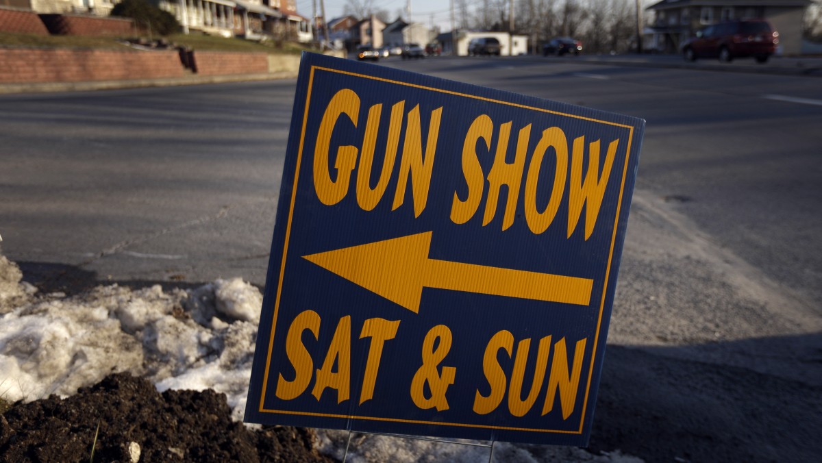 A sign is posted for an upcoming gun show, Friday, Jan. 4, 2013, in Leesport, Pa. (AP Photo/Matt Rourke)