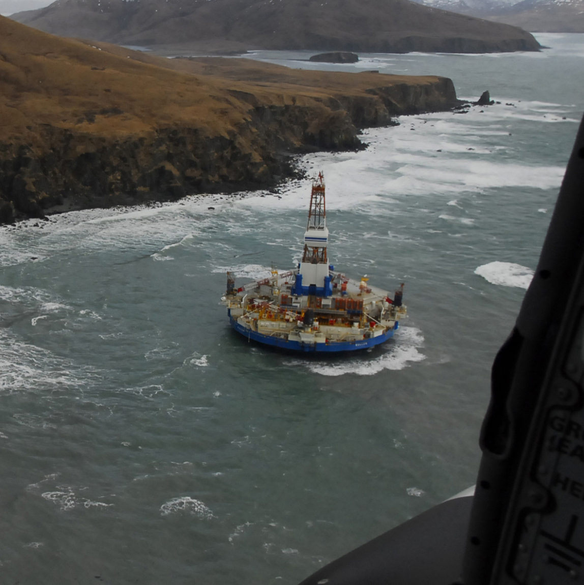 In this image provided by the U.S. Coast Guard the conical drilling unit Kulluk sits grounded near a beach 40 miles southwest of Kodiak City, Alaska, Thursday, Jan. 3, 2012. (AP Photo/U.S. Coast Guard, Petty Officer 2nd Class Zachary Painter)