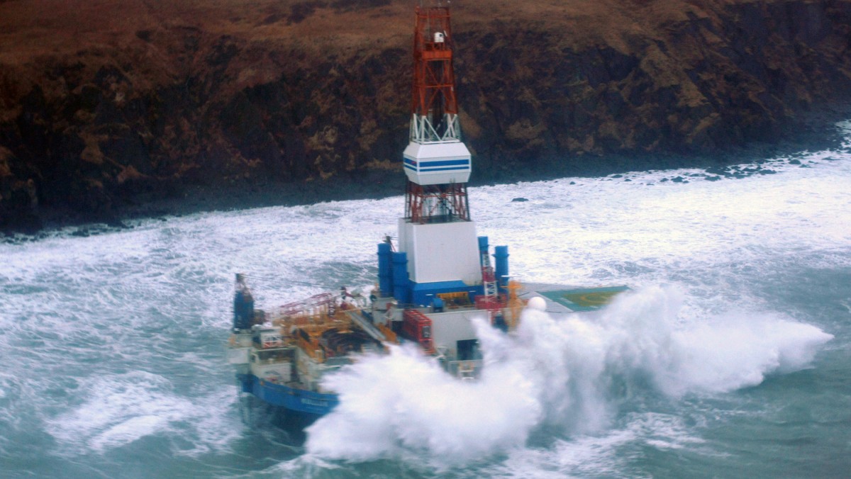 This image provided by the U.S. Coast Guard shows the Royal Dutch Shell drilling rig Kulluk aground off a small island near Kodiak Island Tuesday Jan. 1, 2013. (AP Photo/U.S. Coast Guard)