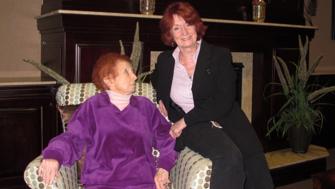 In this Dec. 17, 2012 photo, Marion Johnston, left, and her daughter Linda Monaco, sit in a lounge at the Bristal Assisted Living facility in Massapequa, N.Y. (AP Photo/Frank Eltman)