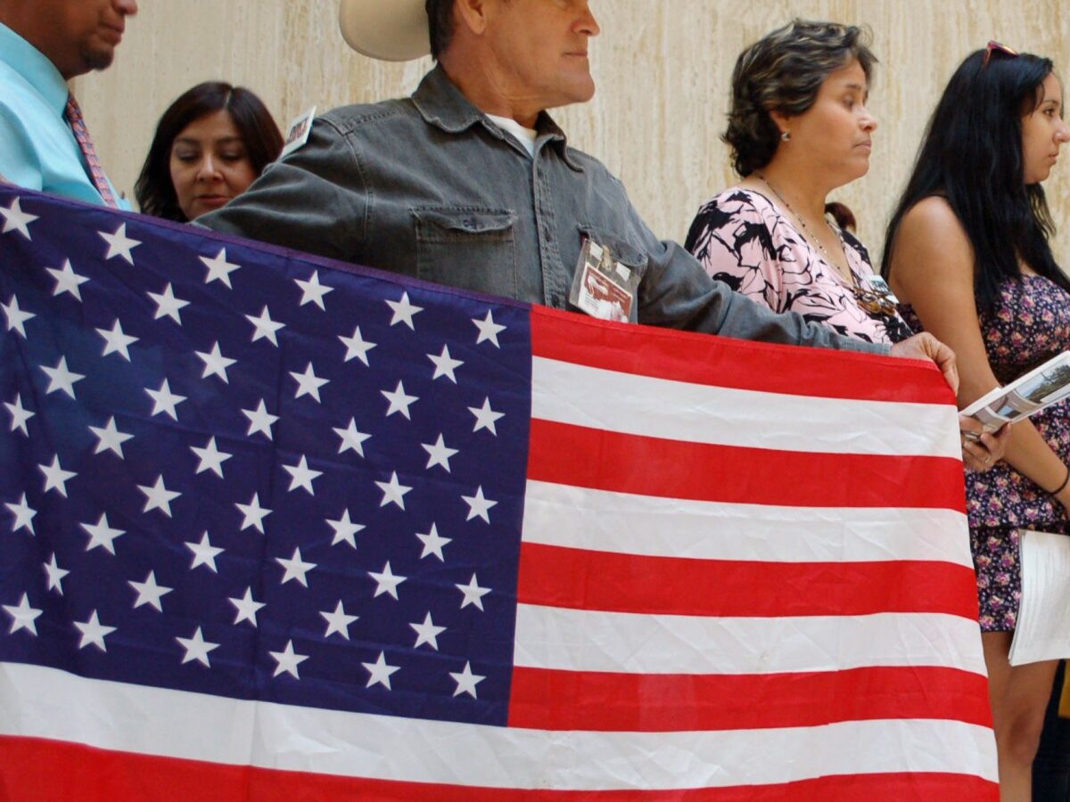 This Sept. 6, 2011 file photo shows protestors during a news conference organized by immigrant advocates at the Capitol in Santa Fe, N.M. (AP Photo/Russell Contreras, File)