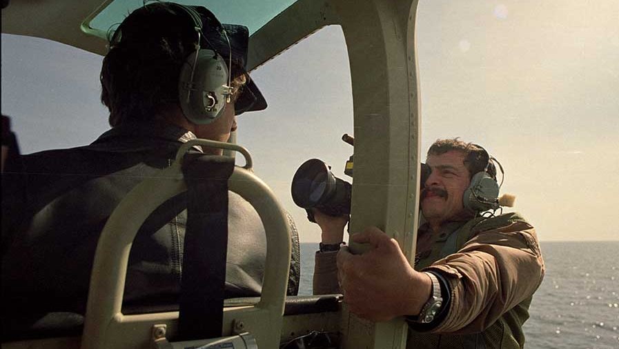 The CNN cameraman filming the pilot in midflight out over the water. All the doors on the helicopter were removed so two photographers and a videographer could work unimpeded. (Photo Norbert Schiller)