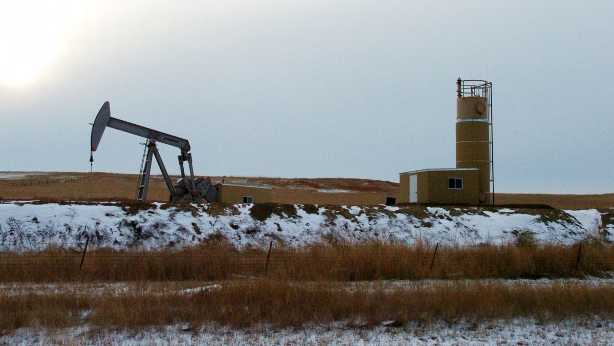 This Feb. 28, 2012 photo shows an oil well near Sidney, Mont. Sidney is experiencing a boom spurred by companies seeking to extract oil from the massive Bakken formation beneath western North Dakota and eastern Montana.(AP Photo/Matthew Brown)