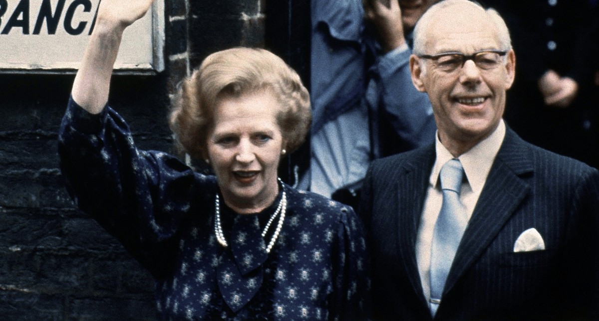 This is a June 9, 1983. file photo of British Prime Minister Margaret Thatcher leaves the Castle lane, Westminster, London England polling station with her husband, Dennis, after casting their votes in the general election.