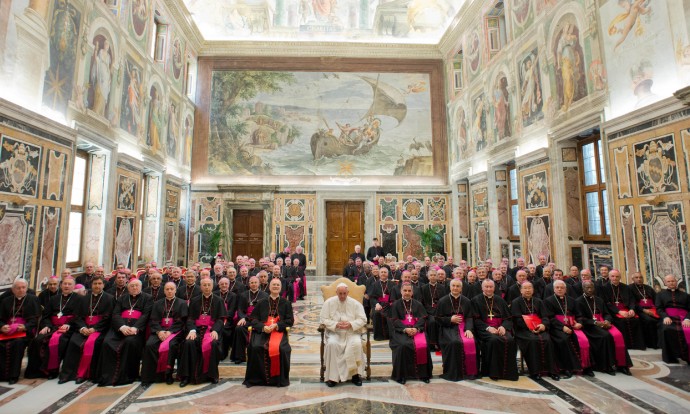 In this photo, Pope Francis, center, meets Apostolic nuncios at the Vatican, Friday, June 21, 2013. (AP/L'Osservatore Romano)