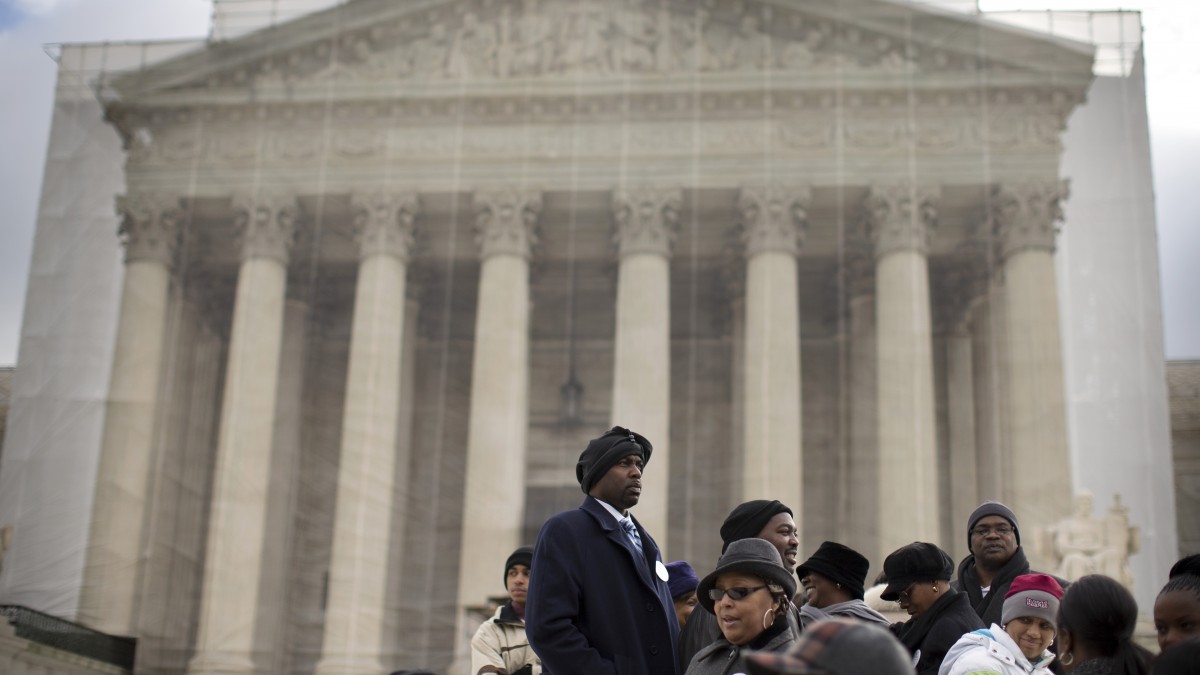 People waited in line outside the Supreme Court in Washington, Wednesday, Feb. 27, 2013, to listen to oral arguments in the Shelby County, Ala., v. Holder voting rights case. (File/AP/Evan Vucci)