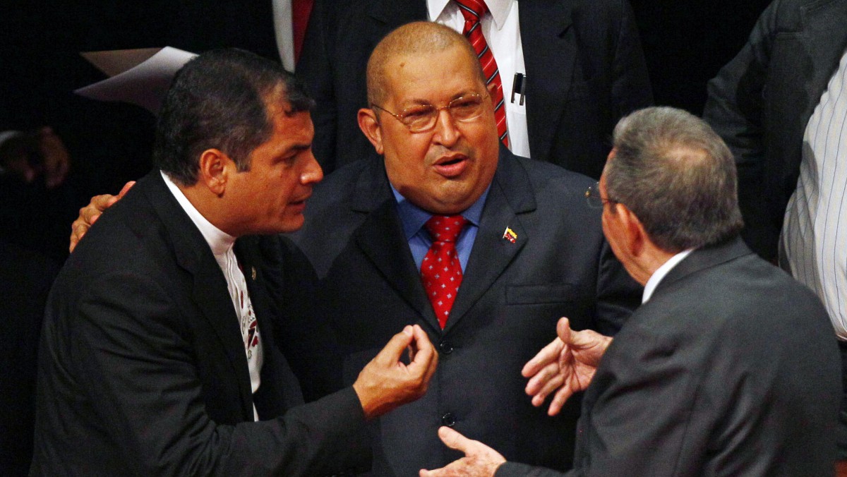 Ecuador's President Rafael Correa, left, Venezuela's late President Hugo Chavez, second left, and Cuba's President Raul Castro talk during the inauguration ceremony of the Latin American and Caribbean States Community, CELAC, summit in Caracas, Venezuela, Friday, Dec. 2, 2011. The three respective countries may now be vying to be NSA whistleblower Edward Snowden's asylum destination of choise. (File/AP/Ariana Cubillos)