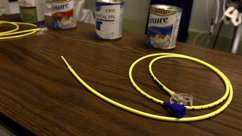 A table is set with feeding tubes and high-nutrition shakes which are used to force-feed those Guantanamo detainees who are on hunger strike or are otherwise unwilling or unable to feed themselves, at the detainee hospital inside the detention facility at Guantanamo Bay U.S. Naval Base, Cuba. (AP/Brennan Linsley)