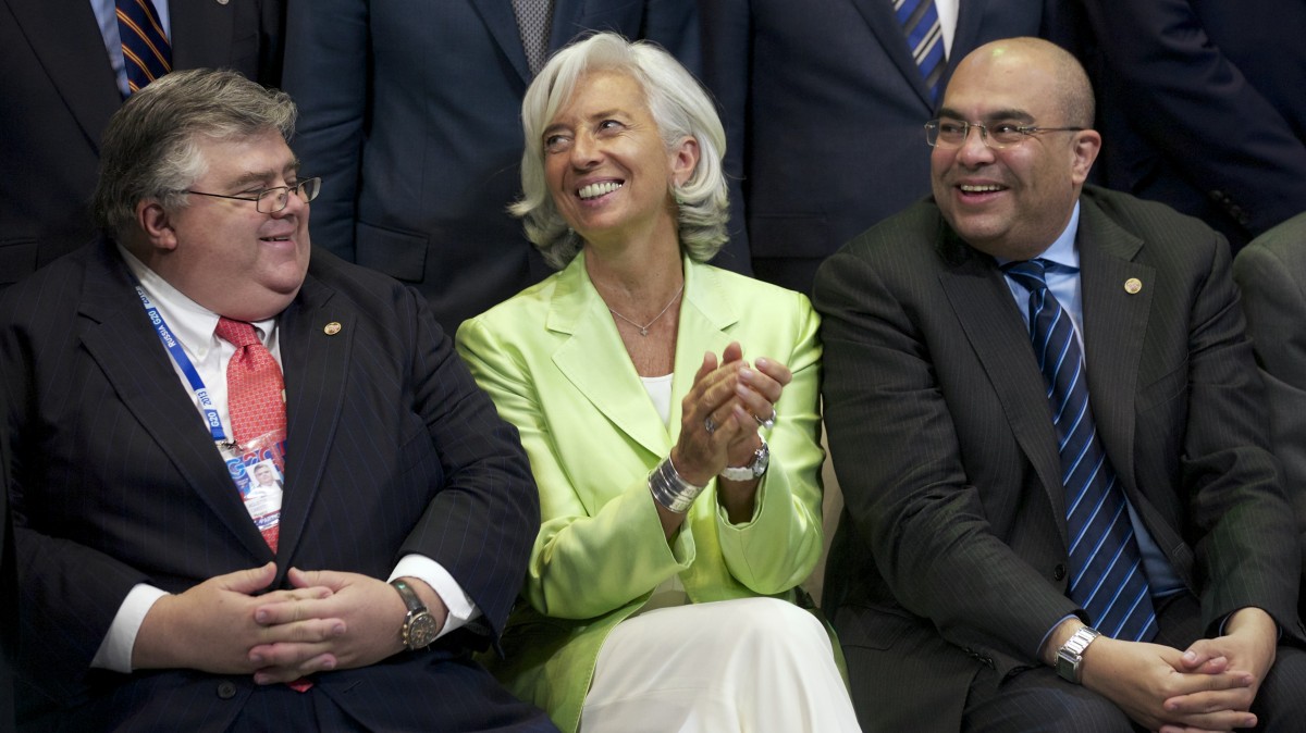 From left, Mexico's Central Bank Governor Agustin Carstens, Managing Director of the International Monetary Fund Christine Lagarde, and Special Envoy for the President of the World Bank Mahmoud Mohieldin pose for a group photo after a meeting of the Group of 20 finance ministers in Moscow, Russia, Saturday, July 20, 2013. (AP/Alexander Zemlianichenko)