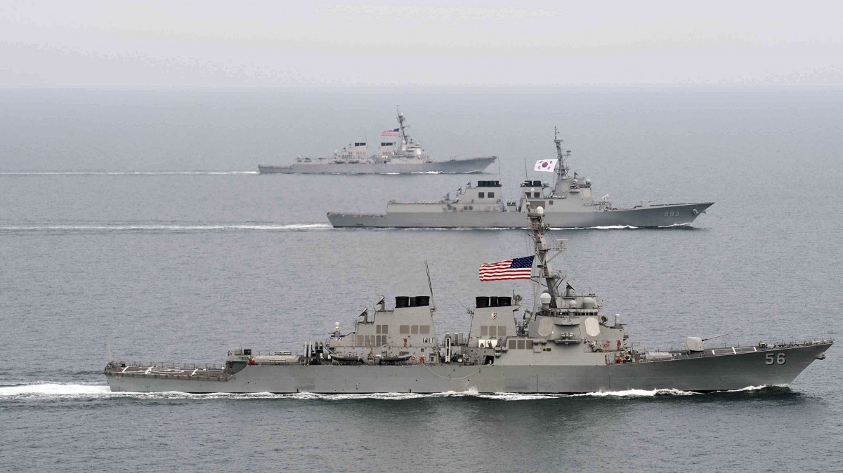 In this photo taken on Sunday, March 17, 2013, and released by the South Korean Navy via Yonhap on Monday, March 18, 2013, South Korea and U.S. warships participate in their joint military drill Foal Eagle in South Korea's West sea.(AP Photo/South Korea Navy via Yonhap) KOREA OUT
