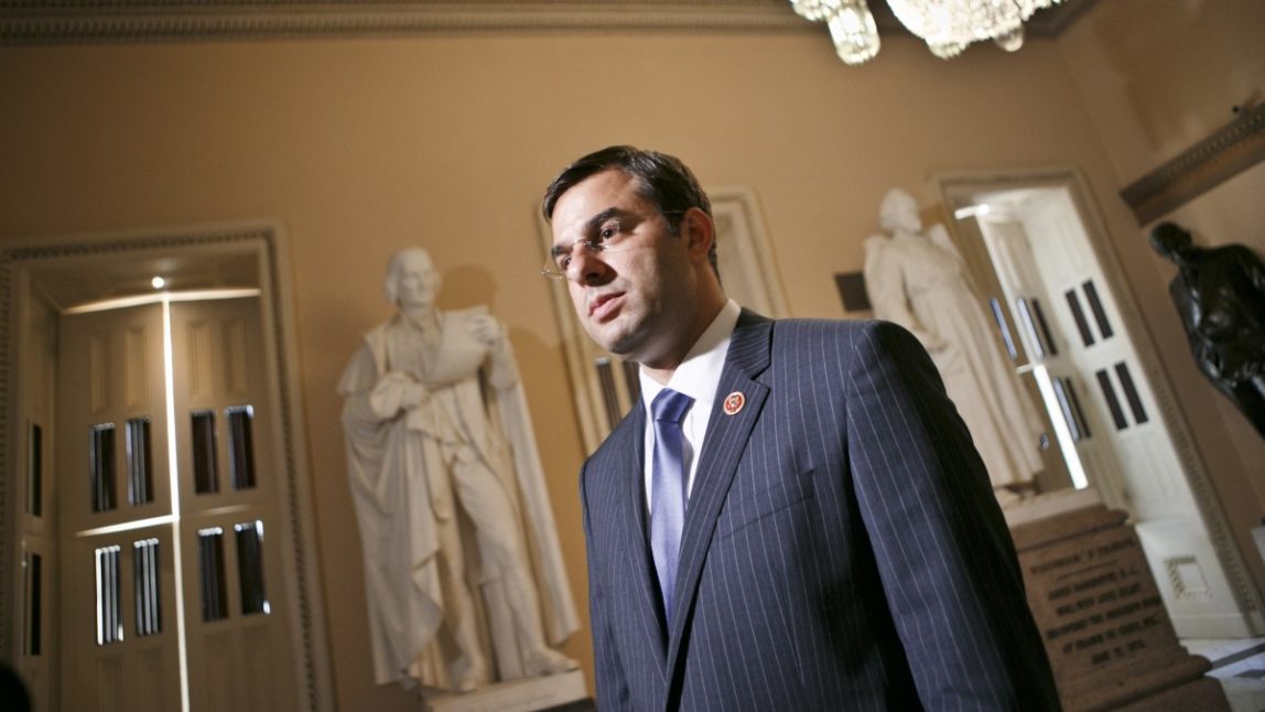 Rep. Justin Amash, R-Mich., comments about the vote on the defense spending bill and his failed amendment that would have cut funding to the National Security Agency's program that collects the phone records of U.S. citizens and residents, at the Capitol, Wednesday, July 24, 2013. The Amash Amendment narrowly lost, 217-205. The White House and congressional backers of the NSA's electronic surveillance program lobbied against ending the massive collection of phone records from millions of Americans saying it would put the nation at risk from another terrorist attack. (AP Photo/J. Scott Applewhite)
